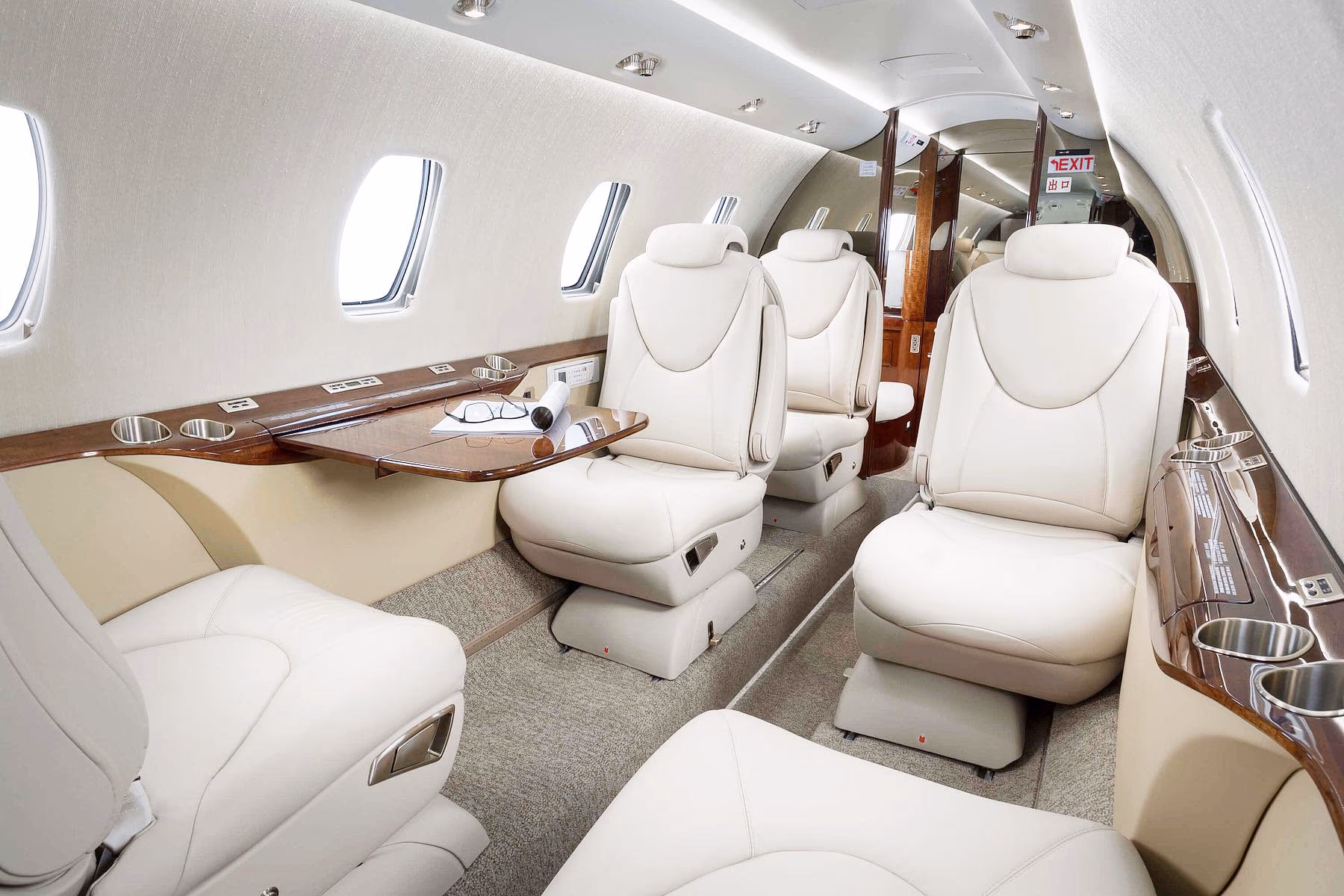 Citation XLS+ cabin with club seating and woodgrain finish